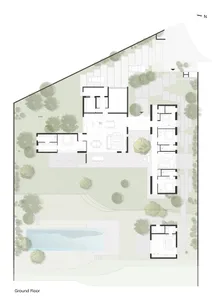 Floor plan of a modern residential layout featuring concrete and glass materials.