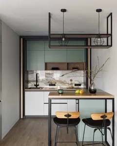 Modern mint green kitchen cabinets with a minimalist design