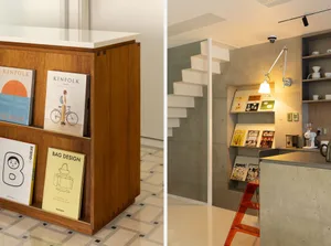 Modern bookstore with a concrete staircase and wooden shelves