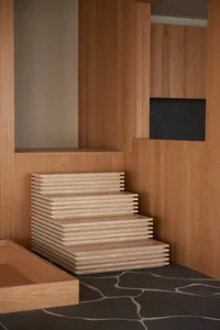 Modern staircase made of wood in a minimalist interior design setting