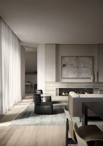 Modern living room featuring a concrete fireplace, leather furniture, and wood flooring.