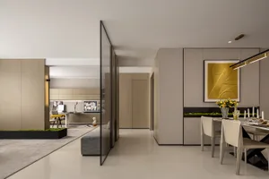 A modern living room featuring wood, glass, and metal materials.