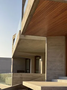 Modern building exterior with concrete walls and wood accents