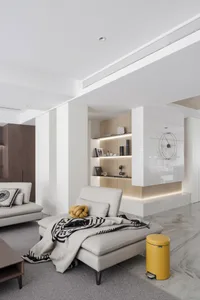 Modern living room featuring neutral-toned leather furniture, minimalist design, and sleek, contemporary decor.