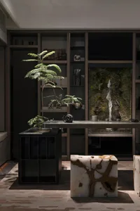 Modern living room with marble accents and a glass partition