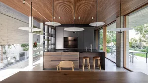 Modern kitchen with wooden accents and a black countertop.
