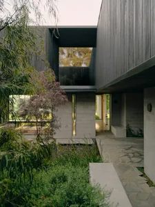 A modern exterior architectural design featuring concrete materials.