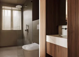 Modern minimalist bathroom with wood accents and a white toilet.
