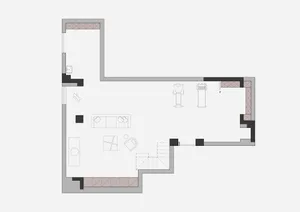 A floor plan of an industrial office interior with exposed concrete walls.