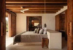 Modern minimalist bedroom featuring wooden furnishings and a cozy ambiance.