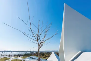 Modern architecture featuring metallic and glass materials.
