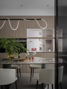 Modern dining room with marble table and minimalist design