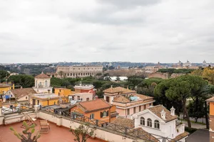 View of a picturesque cityscape featuring rooftops and historical architecture with a romantic atmosphere.
