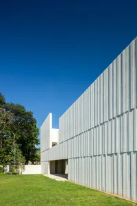 Modern house featuring metal panels on its exterior