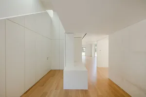 Modern interior design featuring wooden flooring in a floor plan layout.