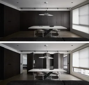 A modern dining room with black and white decor, featuring a wooden dining table and minimalist design.