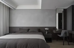 Modern minimalist bedroom featuring a concrete headboard and neutral color palette.