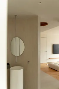 Modern bathroom with concrete walls and minimalist design.