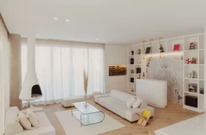 A modern white living room with wooden floors, glass coffee table, and marble accents.