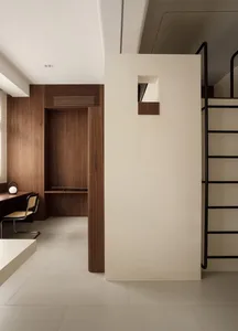 Modern minimalist interior design with wooden finishes and clean lines.