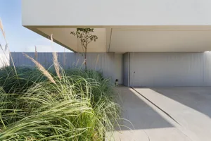 Concrete and steel entrance area of a modern residential home.