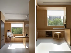 極簡住宅室內空間，搭配木質元素與木質扶手。