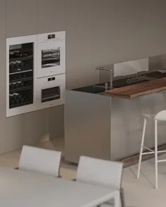 Modern kitchen with stainless steel appliances and wine cooler.