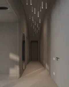 現代極簡走廊，混凝土牆面與地板，狹長空間內設有一扇門與圓形元素
