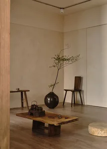 Minimalist interior design featuring wooden elements and a simple, elegant aesthetic.