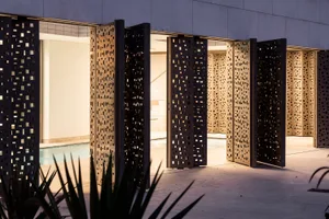 Modern metal folding screens with geometric patterns.