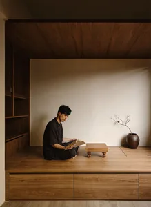 A minimalist living room featuring wooden elements