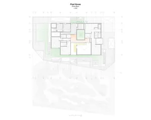 Floor plan of Pixel House, showing the first level layout with different rooms and spaces.