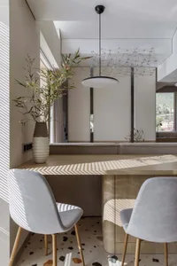 Modern Scandinavian interior design featuring minimalist furniture, natural wood accents, and terrazzo flooring.