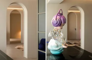 Modern ceramic sculpture with abstract design and purple headphones.
