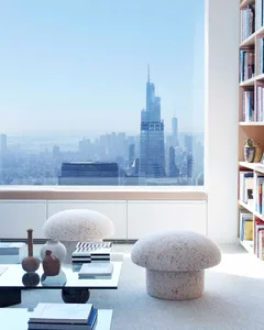 Modern residential interior with a concrete floor and minimalist decor.