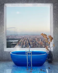 Ceramic bathtub in a modern bathroom overlooking a city skyline.