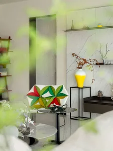 A modern interior living room featuring glass elements and minimalist design.