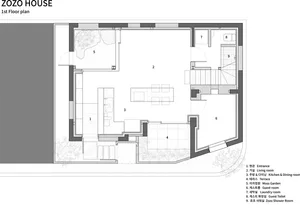 A modern floor plan featuring a concrete interior design with a living room, kitchen, and dining area.