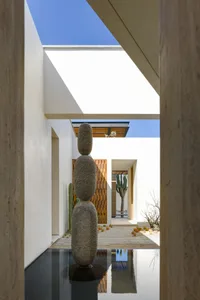 Modern interior space featuring concrete materials and minimalist decor.