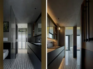 Modern bathroom featuring minimalist design with concrete finishes and sleek fixtures.