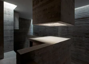 Modern minimalist architecture featuring industrial concrete elements