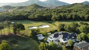 Aerial view of a modern residential house with a contemporary design.