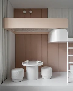 A minimalist bedroom featuring a modern bunk bed system with white furniture and soft furnishings against a brown upholstered