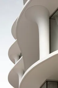 Modern balcony with curved concrete design
