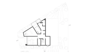 Concrete floor plan layout of a residential building's lower level.