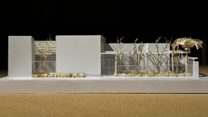 Modern white architectural model with minimalist design and white materials.