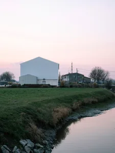 A modern building constructed primarily of concrete materials.