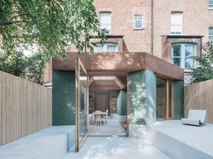 A modern exterior house extension made of concrete.