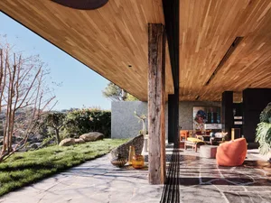 A modern, bamboo-infused interior space with wooden flooring and high-contrast design elements.