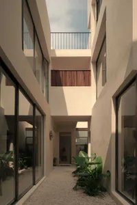Concrete walls with glass windows in a modern residential space.